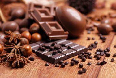 Assorted chocolate on wooden table