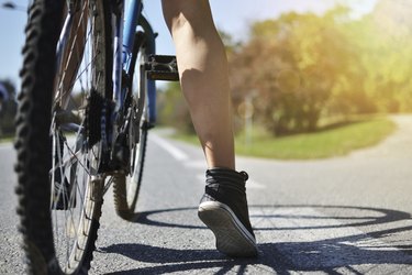 young woman with bicycle