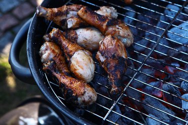 Chicken legs roasted on fire