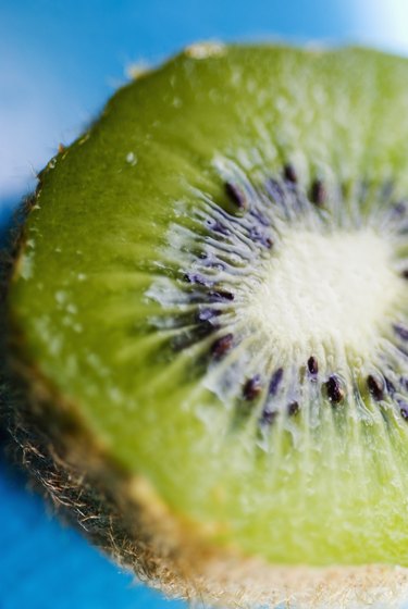 Close-up of a kiwi cut in half.