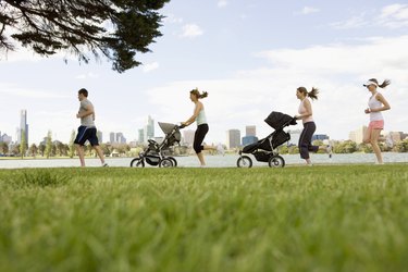 Joggers Running in Park