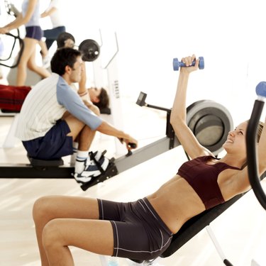 people exercising at a gymnasium