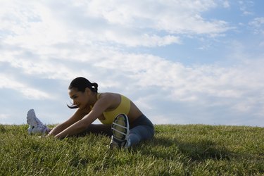 Woman stretching outdoors