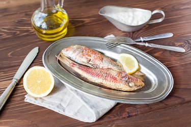 Fried red mullet on the oval dish