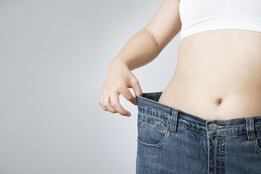 Woman in jeans of large size, concept weight loss