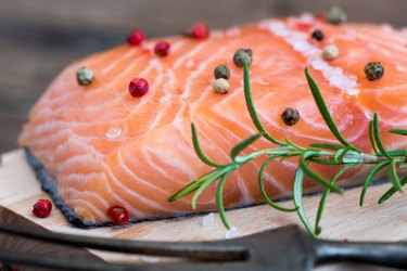 Raw Salmon Fish Fillet with Fresh Herbs