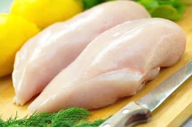 Raw chicken fillet with vegetables prepared for cooking