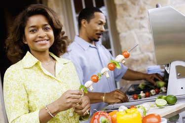 Couple cooking in kitchen