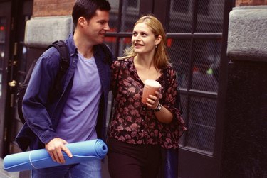 Couple with yoga mat