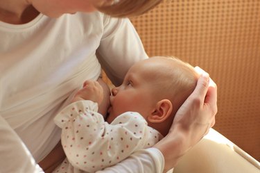 mother breastfeeding baby 1