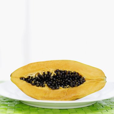 Close-up of a sliced papaya on a plate
