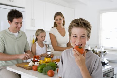 Family preparing food together