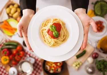 Chef at work cooking pasta