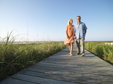 Couple Strolling on Boardwalk