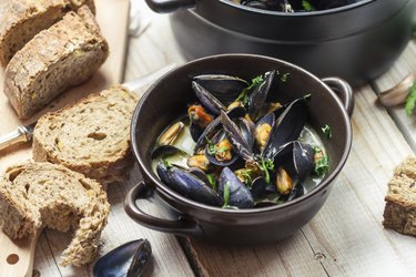 Closeup of freshly cooked mussels at dinner