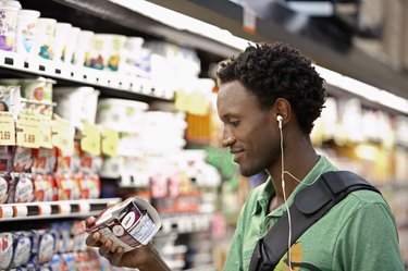 Man Reading Nutrition Label