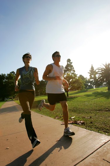 Couple jogging in park