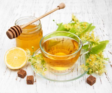cup of herbal tea with linden flowers