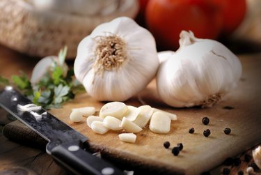 fresh garlic on wooden table