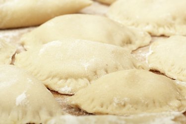 Raw Dumplings with potato on tray