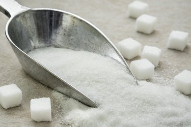 Sugar on metal scoop