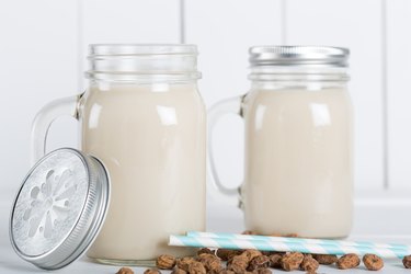 Two mason jar glasses of homemade horchata.