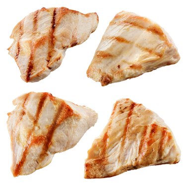 Grilled chicken meat pieces isolated on white. Collection