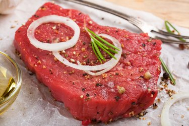 Raw beef steak and spices