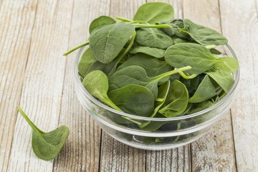 bowl of baby spinach, a high-fiber, low-calorie food