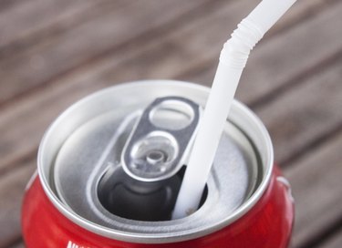 Was the soda can tab really invented to hold the straw in place