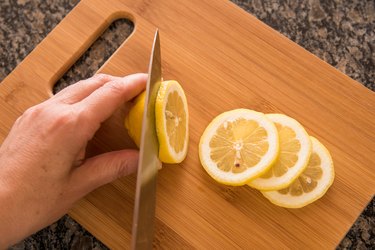 Slicing a fresh lemon