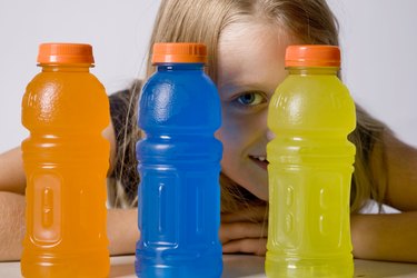Young Girl Chooses Sports Drink