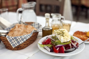 Greek salad with country bread and home made white wine