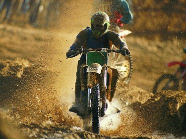 Motorcycle racer on dirt track