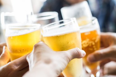 Friends toasting with beer