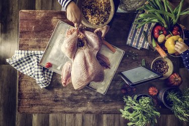 Raw Turkey with Vegetables Ready to be Prepared for Holidays