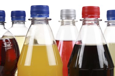 Different bottles with soda