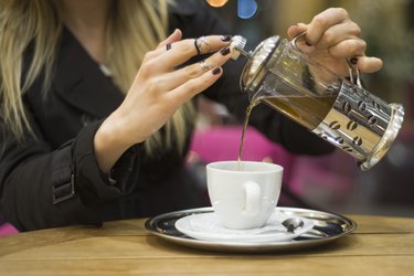 A self-filtering mug that takes care of the tea-bag while you sip