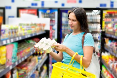 woman buys canned