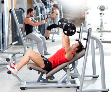 group with weight training equipment on sport gym