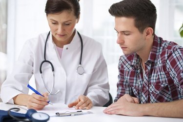 doctor with male patient