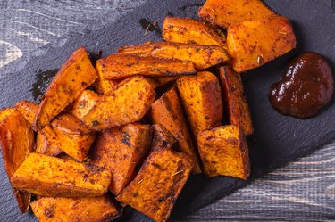 Homemade Cooked Sweet Potato with spices and herbs.