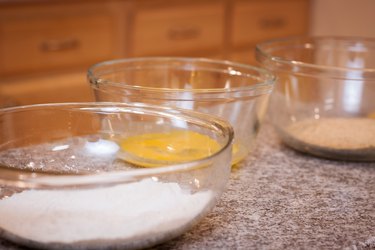 Bowls with flour, eggs and breadcrumbs