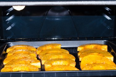 banana squash slices in the oven roasting
