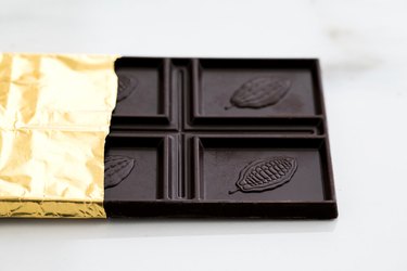 Chocolate bar wrapped in gold foil