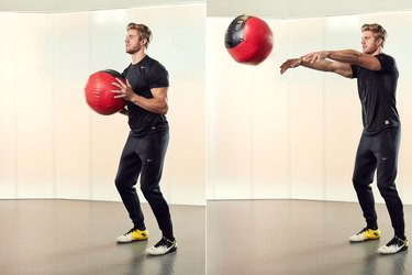 Man Demonstrating How to Do a Medicine Ball Chest Pass