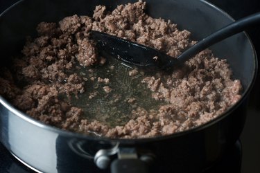 draining of beef fat in pot