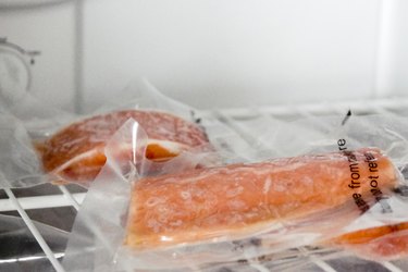 Salmon thawing in the fridge