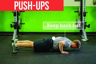 Man doing push-ups with proper form to prevent back pain