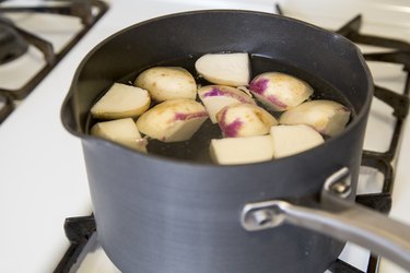turnips in a pot of boiling water